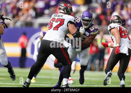 Tampa Bay Buccaneers guard Luke Goedeke (67) prepares to make a