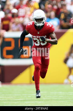 Arizona Cardinals cornerback Christian Matthew (35) warms up