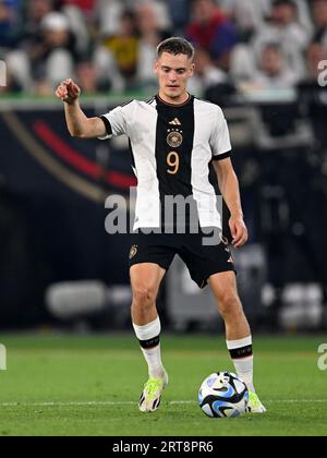 WOLFSBURG - Florian Wirtz of Germany during the friendly International match between Germany and Japan at the Volkswagen Arena on September 9, 2023 in Wolfsburg, Germany. ANP | Hollandse Hoogte | GERRIT VAN COLOGNE Stock Photo