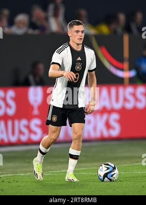 WOLFSBURG - Florian Wirtz of Germany during the friendly International match between Germany and Japan at the Volkswagen Arena on September 9, 2023 in Wolfsburg, Germany. ANP | Hollandse Hoogte | GERRIT VAN COLOGNE Stock Photo