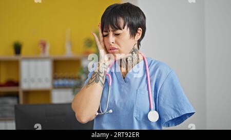 Hispanic Woman With Amputee Arm Doctor Smiling Confident Listening To ...