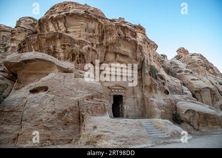 Nabatean rock-cut tomb at the entrance of Little Petra (Siq al-Barid,), Jordan Stock Photo
