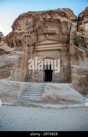 Nabatean rock-cut tomb at the entrance of Little Petra (Siq al-Barid,), Jordan Stock Photo