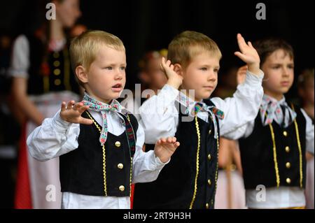 Czech and Slovak children performing traditional Czech and Slovak songs and dances at an event in Luxembourg. Stock Photo