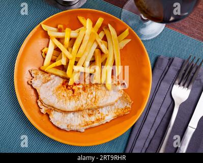 Fried barbecue pork meat with baked potato Stock Photo