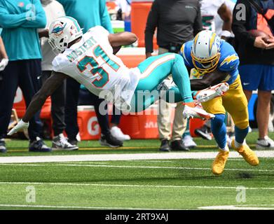 Inglewood, United States. 10th Sep, 2023. Dolphins Quarterback Tua  Tagovailoa passes the ball against the Chargers in first quarter action at  SoFi Stadium in Inglewood, California on Sunday, September 10, 2023. The