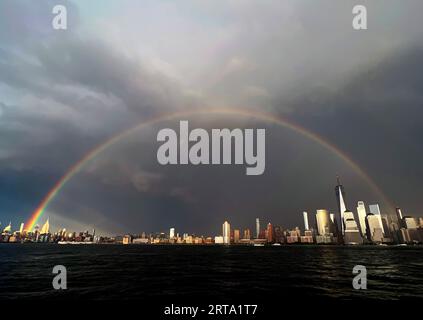 https://l450v.alamy.com/450v/2rta1t7/hoboken-united-states-11th-sep-2023-a-rainbow-appears-near-the-empire-state-building-one-world-trade-center-and-the-manhattan-skyline-after-a-thunderstorm-on-the-22nd-anniversary-of-the-terrorist-attacks-on-the-world-trade-center-at-ground-zero-from-hoboken-new-jersey-on-monday-september-11-2023-photo-by-john-angelilloupi-credit-upialamy-live-news-2rta1t7.jpg