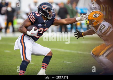 Green Bay Packers' Keisean Nixon trto get past Chicago Bears' Josh Blackwell  during the first half of an NFL football game Sunday, Dec. 4, 2022, in  Chicago. (AP Photo/Charles Rex Arbogast Stock