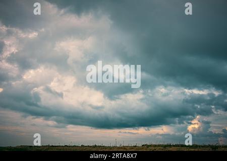 Dramatic rainy sky and dark clouds. Stock Photo