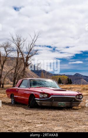 Abandoned car outside a pawn shop in Cortez, Colorado. Stock Photo
