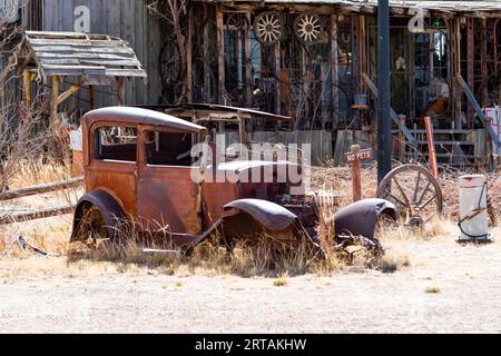Abandoned car outside a pawn shop in Cortez, Colorado. Stock Photo