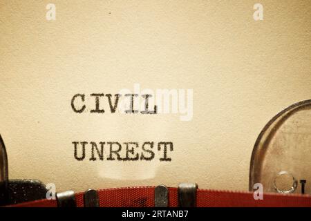 Civil unrest text written with a typewriter. Stock Photo