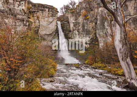 The Chorrillo del Salto waterfall near El Chalten in an autumnal rocky landscape, Argentina, Patagonia Stock Photo