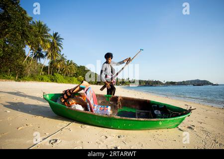 Koh Yao, Thailand; 1st January, 2023: A fisherman preparing his boat to go fishing for squid at night. Stock Photo