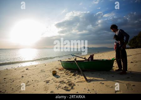 Koh Yao, Thailand; 1st January, 2023: A fisherman preparing his boat to go fishing for squid at night. Stock Photo