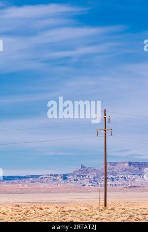 Utility poles in the Arizona desert. Stock Photo