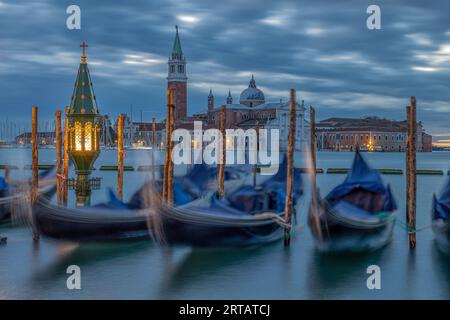 Italy, Veneto, Venice, gondolas, San Giorgio Maggiore in the background, morning mood, cloudy mood Stock Photo
