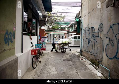 Bangkok, Thailand; 1st January 2023: Person with his mobile street food cart on the streets of Bangkok. Stock Photo