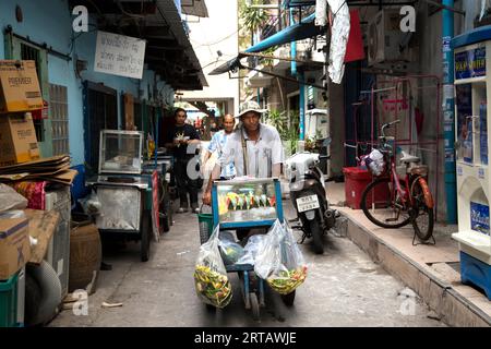 Bangkok, Thailand; 1st January 2023: Person with his mobile street food cart on the streets of Bangkok. Stock Photo