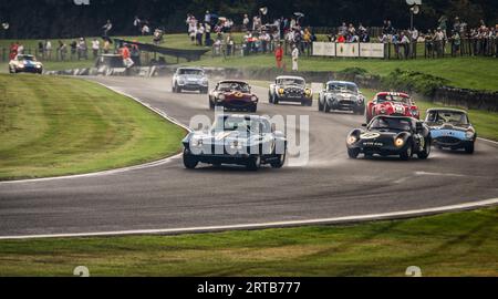 Racing round the track SUSSEX, ENGLAND. STEP BACK IN TIME with images from the goodwood revival event taken between September 8th 2023 and September 1 Stock Photo