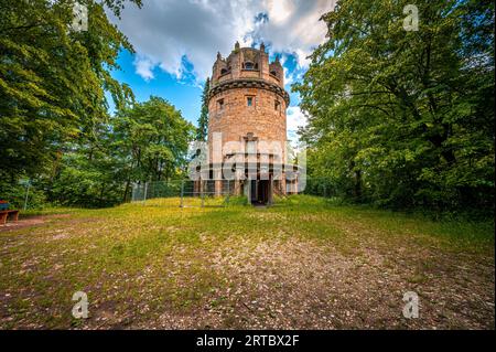 The Bismark Tower in Jena am Forst in the forest with a blue sky and veil clouds, Jena Thuringia, Germany Stock Photo