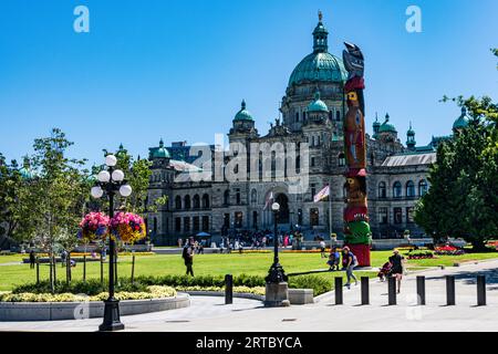 Totem Pole in front of the Parliment Building of British Columbiam in Victoria Canada Stock Photo