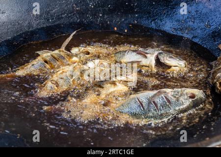 Fish being fried at the fish market in Hawassa, Ethiopia Stock Photo