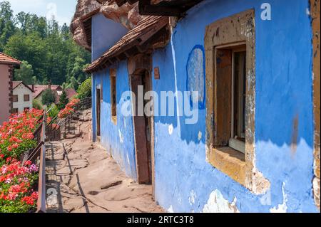 Historic rock dwellings, Maison des rochers, in Graufthal district, Eschbourg, Alsace, France, Europe Stock Photo