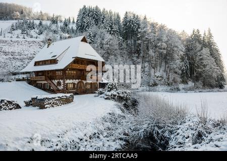 snowy Schwarzwaldhof, Oberhamersbach, Black Forest, Baden-Württemberg, Germany Stock Photo