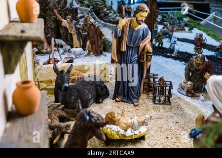Figures of a classic nativity scene decorated with beautiful artistic ...