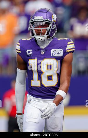 Minnesota Vikings wide receiver Justin Jefferson (18) in action during the  second half of an NFL football game against the Chicago Bears, Sunday, Oct.  9, 2022 in Minneapolis. (AP Photo/Stacy Bengs Stock