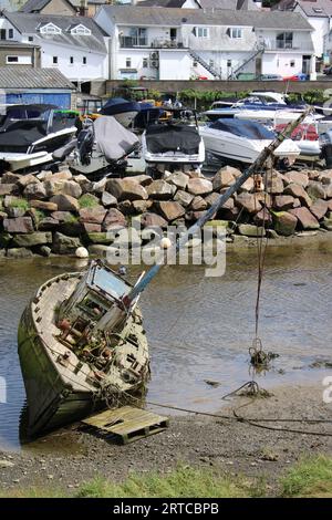 Old yacht abandoned in Abersoch Harbour Stock Photo