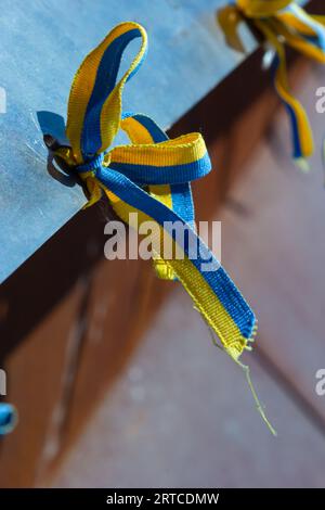 Ribbons with yellow and blue colors of Ukraine during a peaceful demonstration against war, Putin and Russia, Ukrainians, the color of the flag of Ukr Stock Photo