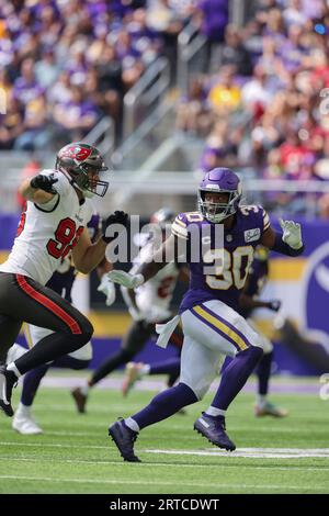 Minnesota Vikings fullback C.J. Ham (30) walks off the field after an NFL  football game against the Chicago Bears, Sunday, Jan. 8, 2023, in Chicago.  (AP Photo/Kamil Krzaczynski Stock Photo - Alamy