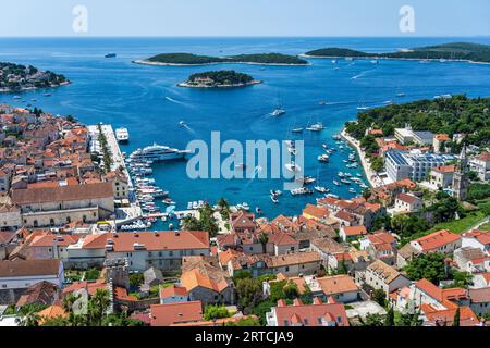 Aerial view of Hvar town (Grad Hvar) and harbour from the Spanish Fortress on the hillside above on Hvar Island on the Dalmatian Coast of Croatia Stock Photo