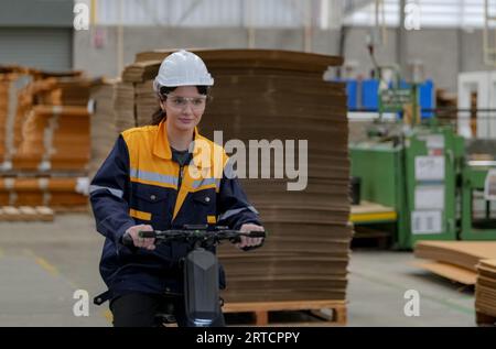 Warehouse Industrial supply chain and Logistics Companies inside. Warehouse workers checking the inventory. Products on inventory shelves storage. Wor Stock Photo