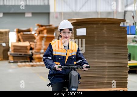 Warehouse Industrial supply chain and Logistics Companies inside. Warehouse workers checking the inventory. Products on inventory shelves storage. Wor Stock Photo