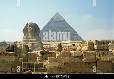 The Great Sphinx of Giza framed by the Great Pyramid of Khufu in the ...