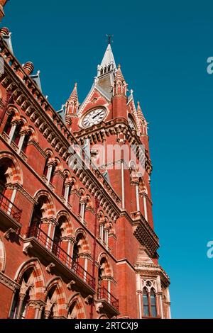 The Victorian Clock Tower On The Midland Grand Hotel At St Pancras Station Designed By George Gilbert Scott, London UK Stock Photo