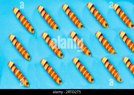 colored, different sweets, lollipops on a blue background. Top view, sweets concept Stock Photo