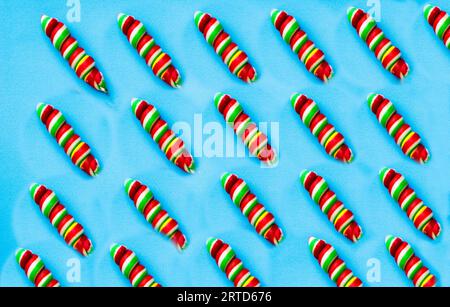 colored, different sweets, lollipops on a blue background. Top view, sweets concept Stock Photo