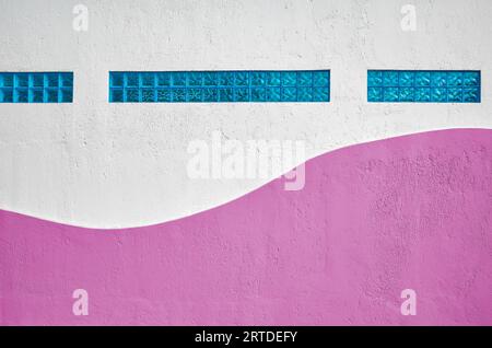 Wall with blue glass blocks, abstract urban background. Stock Photo
