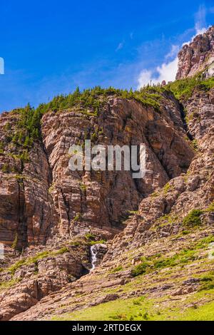 Waterfall  at Siyeh Bend on Going to the Sun Road in Glacier National Park in Montana. Stock Photo