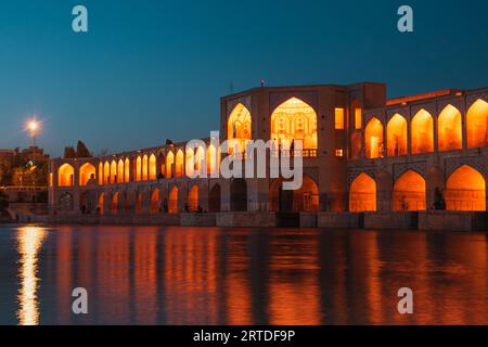 Isfahan, Iran - 15th june, 2022: Old Khajoo bridge at night, across the Zayandeh River in Isfahan, Iran. Stock Photo