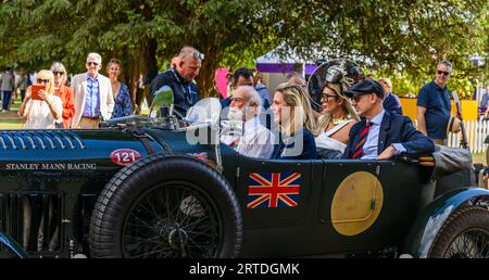 Prince Michael of Kent takes some guests for a jolly in the Stanley Mann Bentley he loves during Concours of Elegance 2023 in Hampton Court Palace Stock Photo