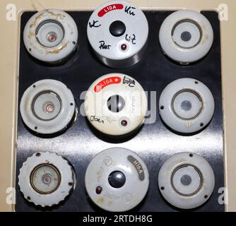 Old Fuse Box With Ceramic Fuses And Some Handwritings On It Stock Photo
