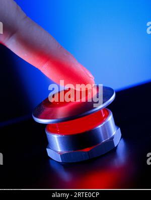 Person Pushing a Panic Button Stock Photo