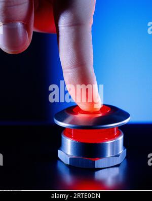 Person Pushing a Panic Button Stock Photo