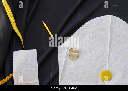 Different Sewing Accessoires On A Black Fabric Background. Sewing Concept. Stock Photo