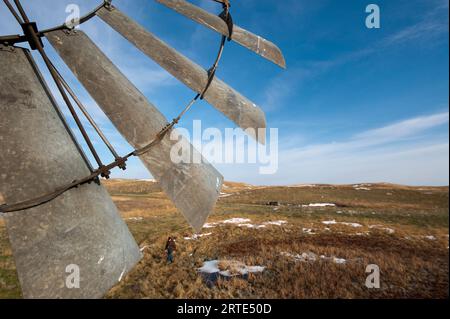 Close-up of the blades of a wind vane on ranch land in the Nebraska Sandhills, USA; Sandhills, Nebraska, United States of America Stock Photo